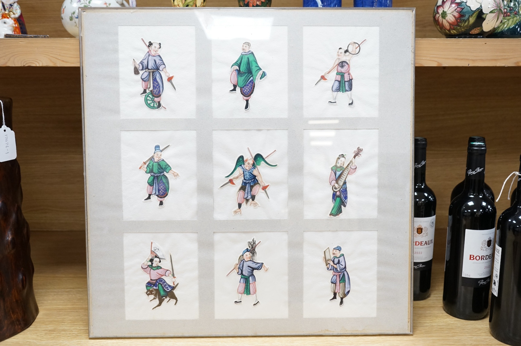 Nine Chinese pith paper painted appliqués, mounted and framed as one, performers and musicians, each 14 x 11cm. Condition - fair, paintings cut out